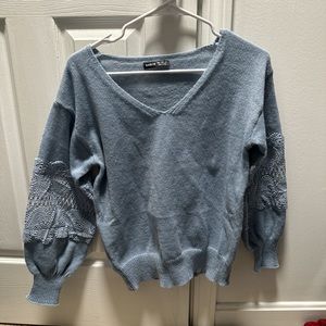 Blue sweater with lace detail